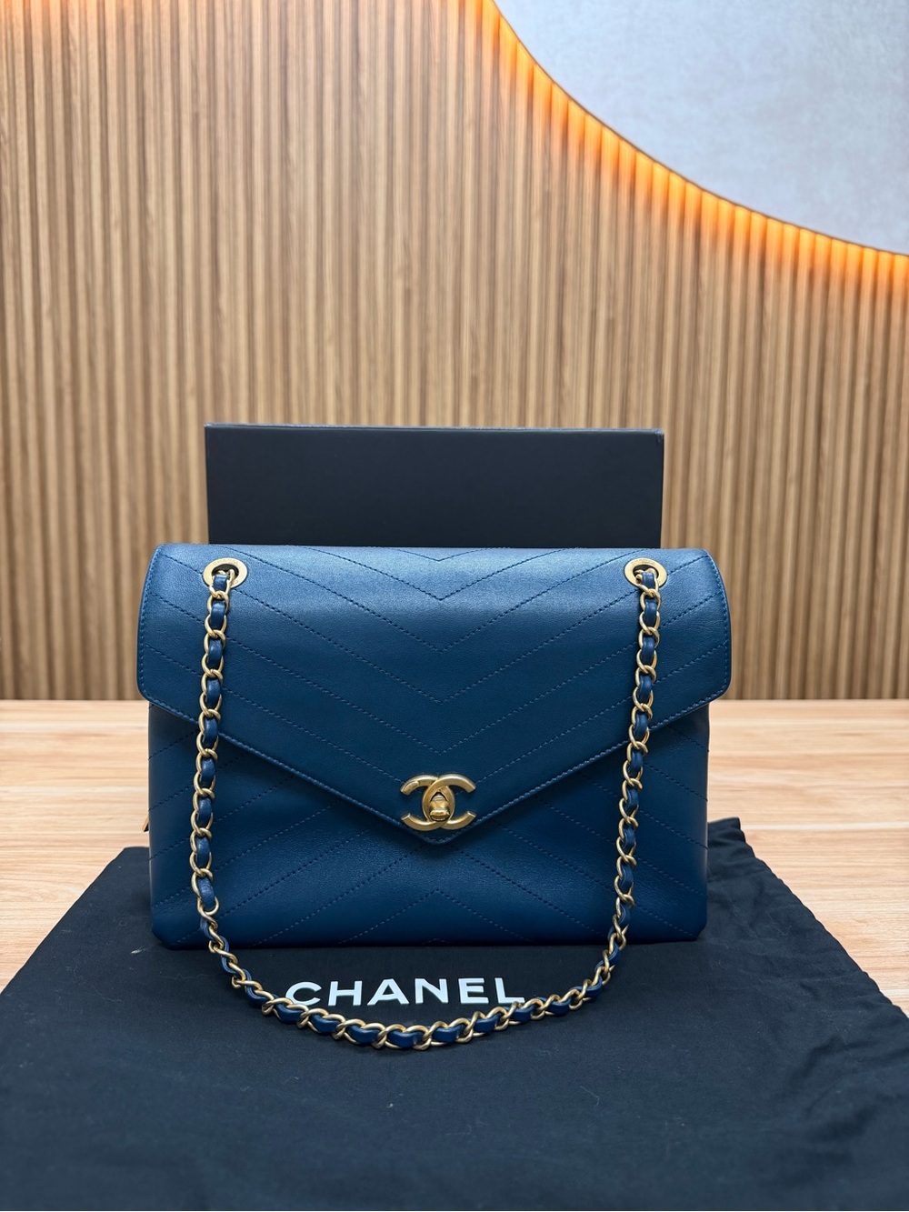 CHANEL Navy Chevron Quilted Flap Bag with Gold Hardware